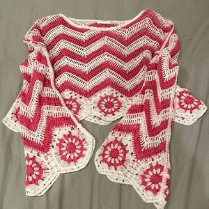 Pink and white crochet cropped beach cover up.